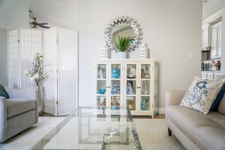 living room decorated with a custom acrylic mirror