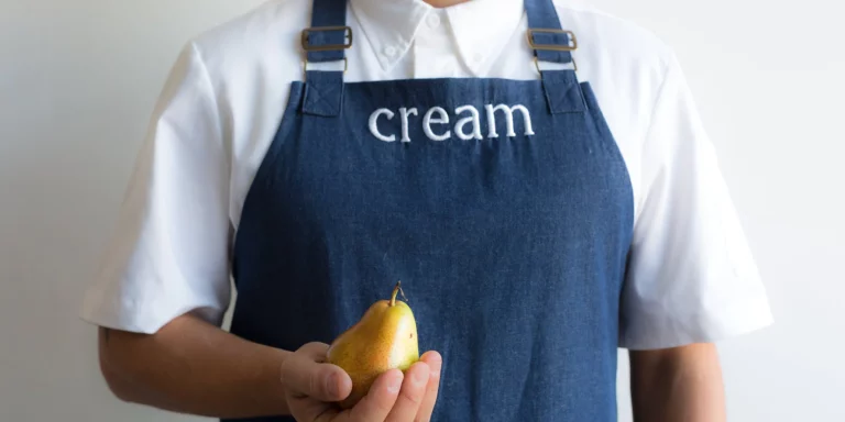 Wear Your Brand With Pride: The Benefits of Personalized Aprons for Businesses