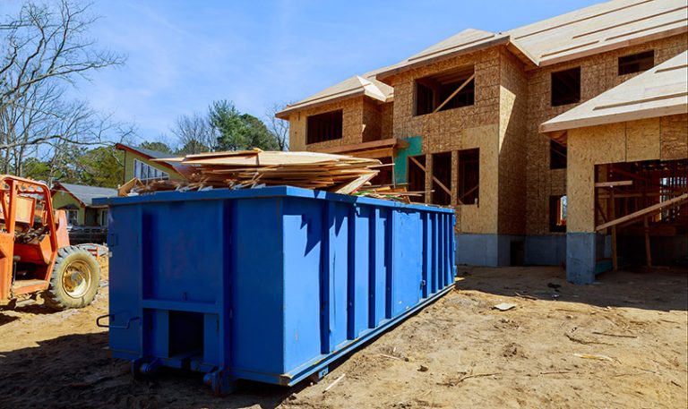 Elevate Your Roofing Game: The Role of Dumpsters in Construction