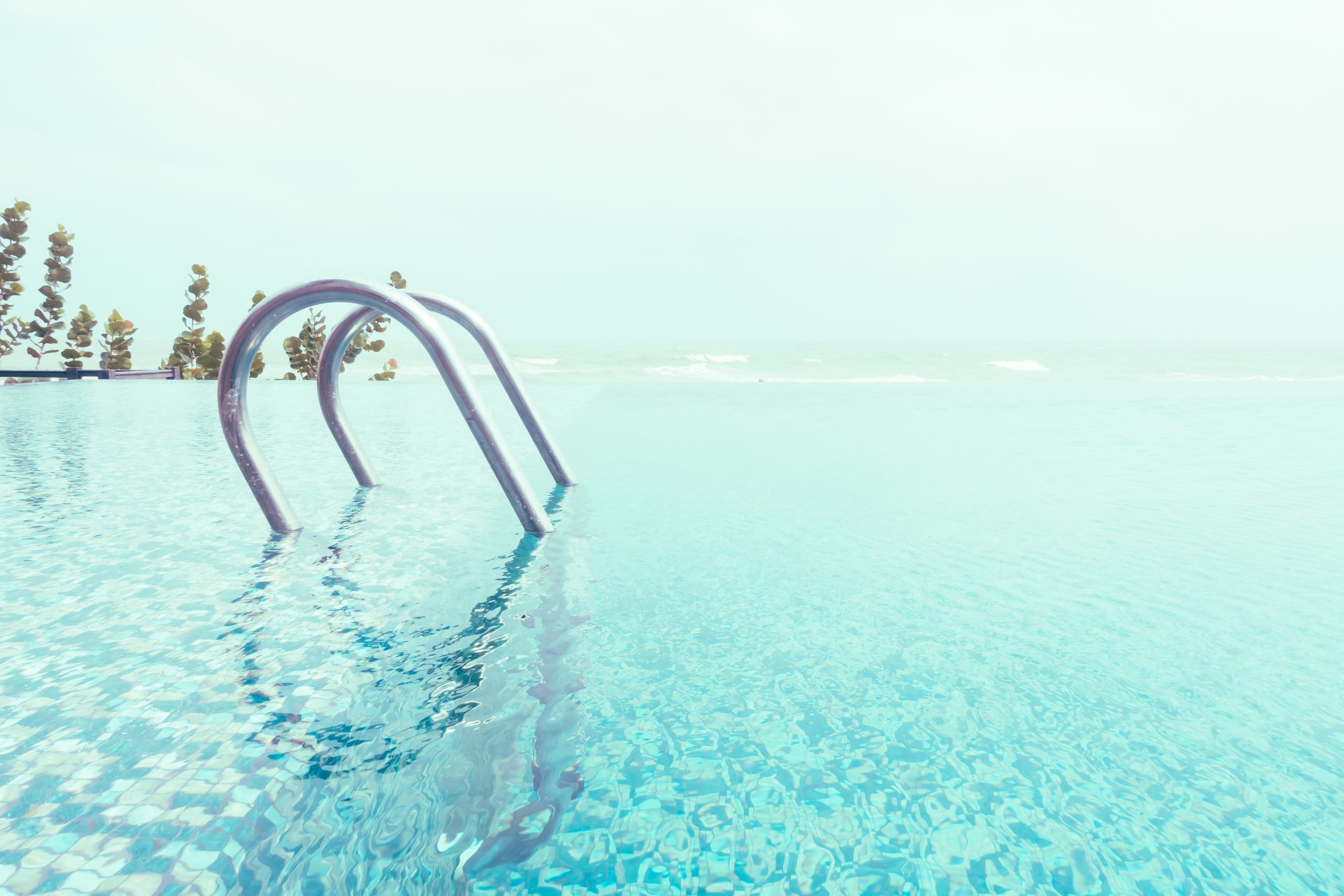 Swimming pool with stair in hotel pool resort - Vintage Filter